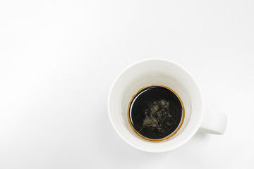 Black coffee in white glass with white background