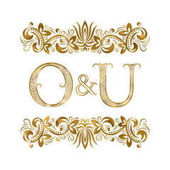 O and U vintage initials logo symbol. The letters are surrounded by ornamental elements. Wedding or business partners monogram in royal style.