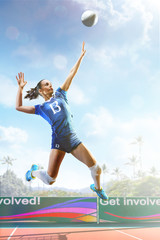 Professional female volleyball player in action on the court
