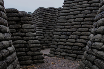 Reconstructed trenches made using concrete moulded sand bags 