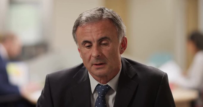 4K Businessman unable to hide his boredom during very boring conference call