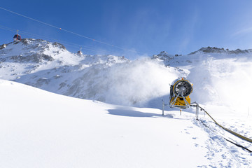 Snow cannon, snowmaker in action at ski resort