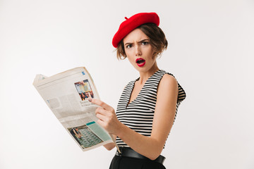 Portrait of a shocked woman wearing red beret