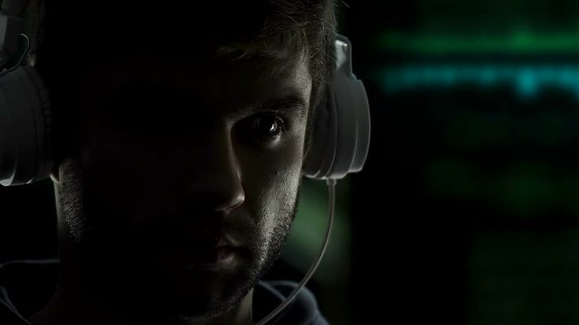 Private detective putting on headphones wiretapping personal conversations