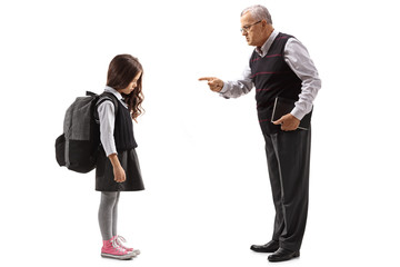 Old teacher scolding a schoolgirl