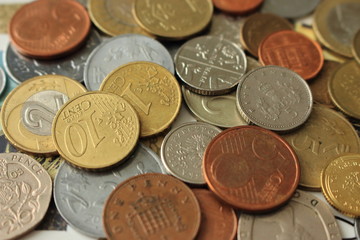Coins background. Metal coin. Money of different countries background. Business and trading...