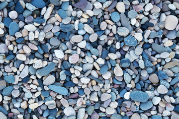 Cold stones beach textured background