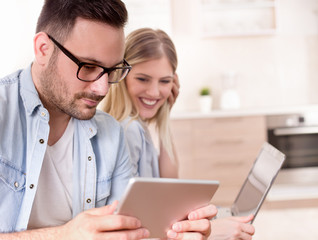 Couple looking at tablet