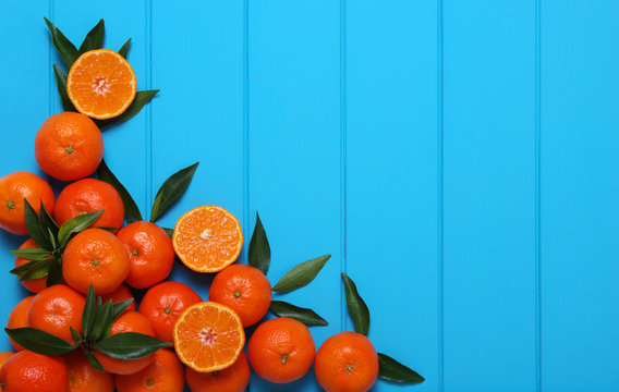 Orange on wooden background.