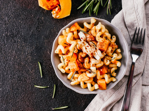 Fusilli pasta with pumpkin, rosemary and brie