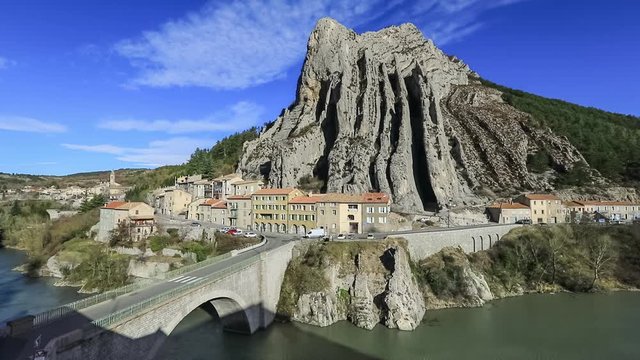 The Rocher de la Baume - unusual shaped rock and bridge over Durance river in Sisteron, Alpes-de-Haute-Provence, France
