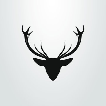 black and white abstract deer head icon