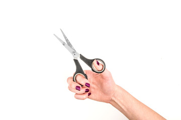 Woman Hand Holding Small Scissors On White Background