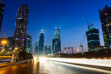 Fototapeta na wymiar Dubai night city scene with light trails