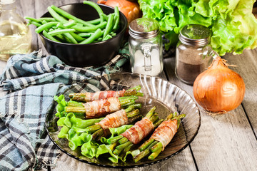 Fried green bean wrapped in smoked bacon