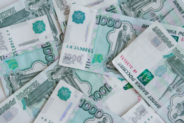 Money in Russia. Banknotes one thousand rubles, background, selective focus