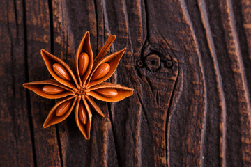 anise stars on a dark rustic background