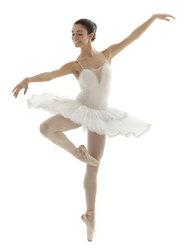 ballerina with white tutu doing the pique pose on white background.