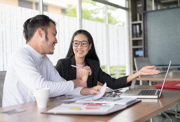 Business people making presentation with the colleagues and business tablet digital computer at the office. Setup studio shooting..