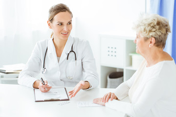 Smiling doctor with stethoscope