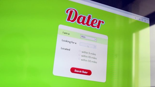 Man looking for a woman using a dating website to find a date. Cursor picks choices and click search button.