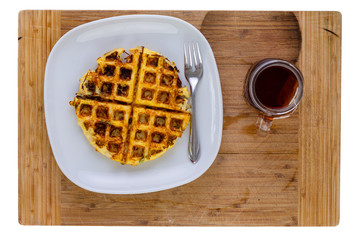 Tasty crispy potato pancake with hot tea