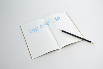 Blank notebook with pencil