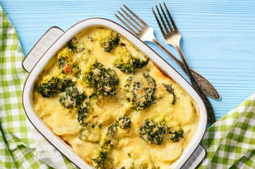 Casserole with broccoli, potatoes, eggs and cheese.
