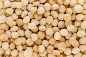 Background texture of fresh natural macadamia nuts - 190095792
