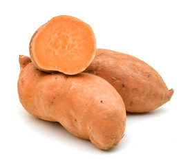 Sweet potatoes on white