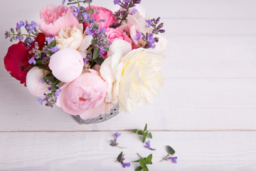 Bouquet of English rose in vase, gift, red candles in the shape of heart, ribbon. Greeting card, invitation in light pastel colors.