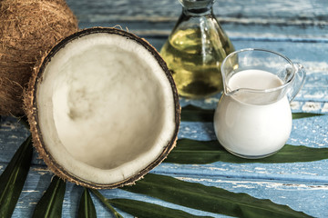 fresh coconuts on old wooden table