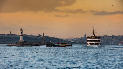 Fototapeta premium Istanbul passenger ferries at sunset. Kadikoy district, Istanbul city, Turkey