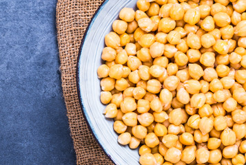Fresh cooked chickpea bowl top view text space.