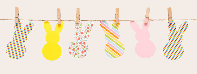 Garland with easter bunnies isolated on white background, copy space