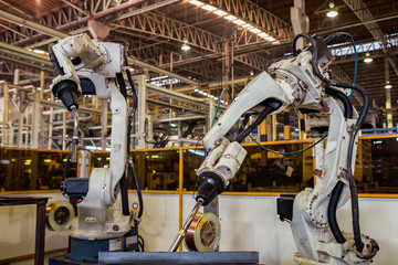 Industrial robot are test run welding 