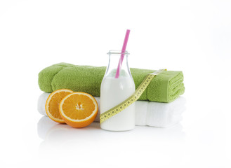 Fototapeta Protein shake with oranges and towels. Summer diet obraz