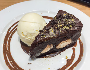 chocolate cake with ice cream on white background