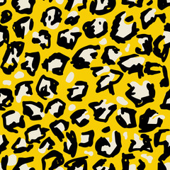Grunge leopard print. Wild seamless pattern. Yellow hand drawn background.