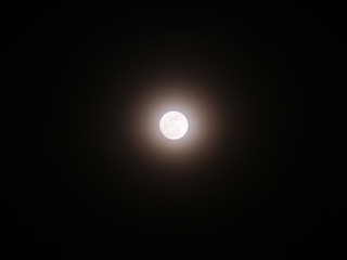 Moon Emitting Light with Halo