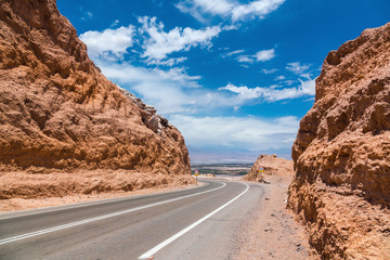 Road in Atacama desert and San Pedro de Atacama view, Chile, South America
