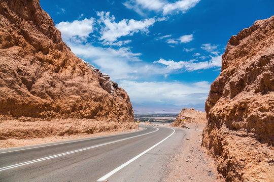 Road in Atacama desert and San Pedro de Atacama view, Chile, South America
