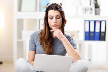 Woman working in her home office