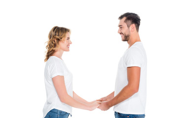 happy couple holding hands, isolated on white