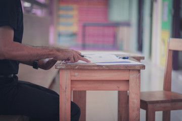Thai Reading Examination between teacher and student grade 4 .Outside the classroom  in primary school.
