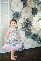Cute little girl in spring studio