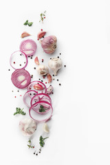 Obraz na płótnie Canvas Fresh garlic, onion and pepper grains on white background, top view