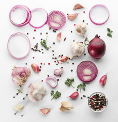 Fresh garlic, onion and pepper grains on white background, top view © Africa Studio