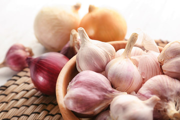 Bowl with fresh garlic, closeup