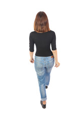 Obraz premium back view of walking woman.